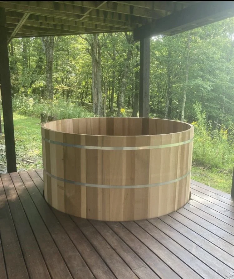 Cedar hot tub with cedar decking and surround system