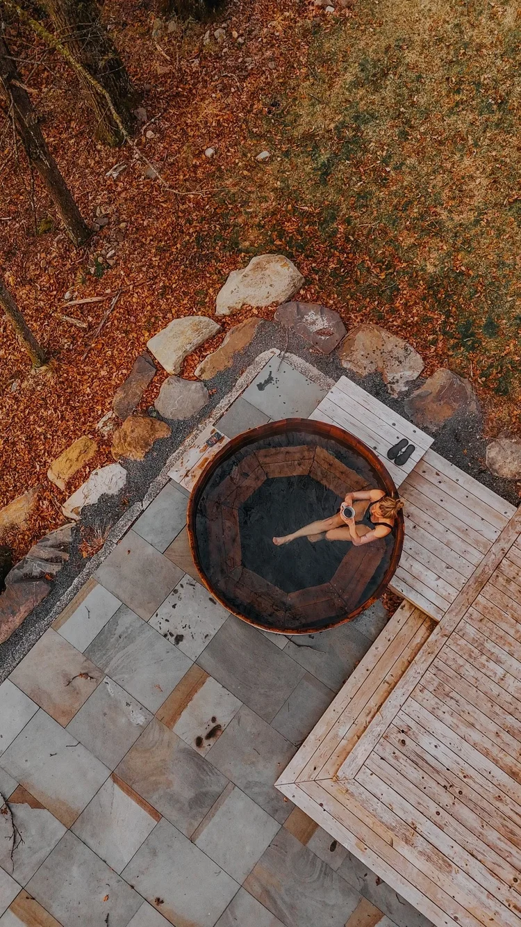 Aerial drone view of cedar hot tub and deck installation on a Hudson Valley property