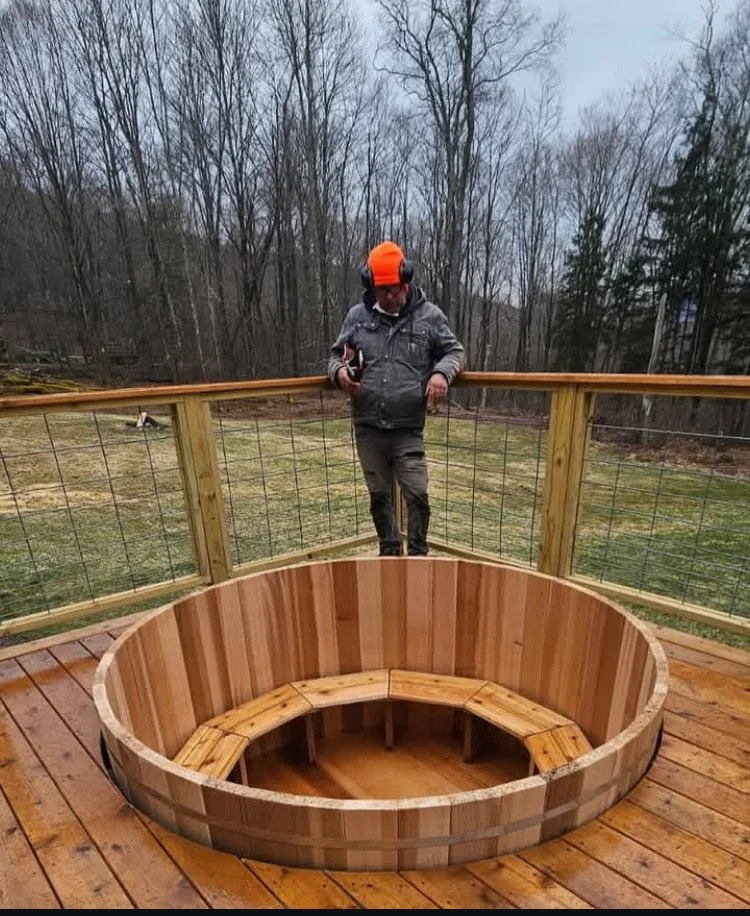 Handcrafted cedar hot tub installed in the Hudson Valley