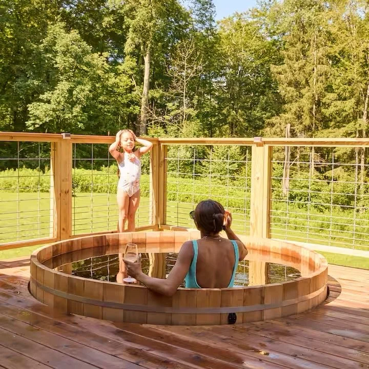 Cedar hot tub installation with mountain views