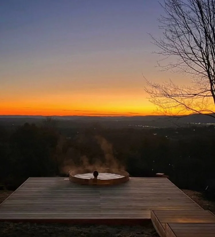 Cedar hot tub detail — natural wood finish and stainless steel banding